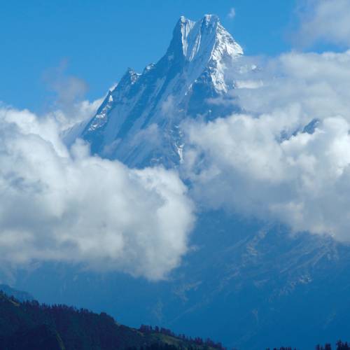 Machapuchare peaking through the clouds