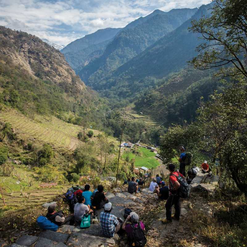 Enjoying a well deserved rest stop on the way up to Gandruk | Mark Tipple