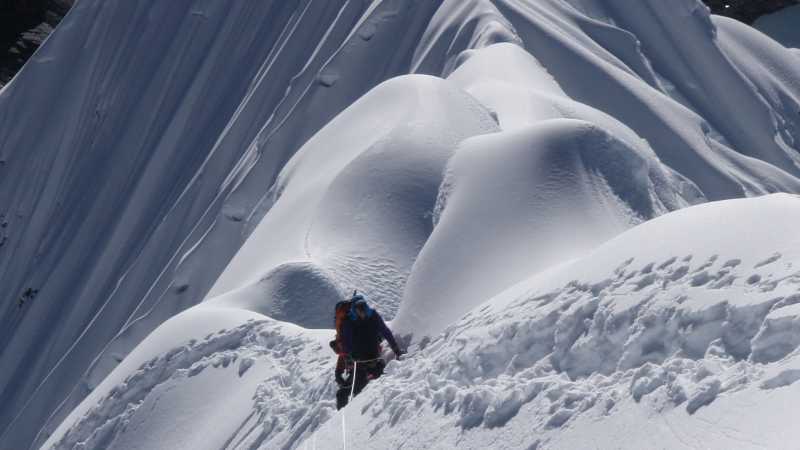 A climber ascends Cholo | Warren Townsden
