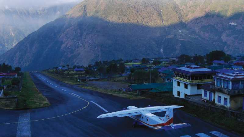 Plane taking off from Lukla Airport | 5kg extra luggage allowance with World Expeditions | Heike Krumm