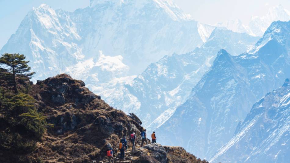 The trail to Thyangboche winds past the face of Ama Dablam | Mark Tipple