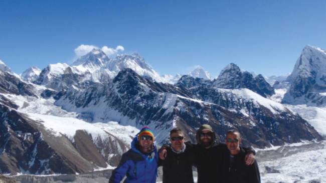 Happy trekkers atop of Gokyo Ri, Nepal | Scott Cardwell