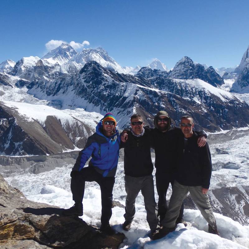Happy trekkers atop of Gokyo Ri, Nepal | Scott Cardwell