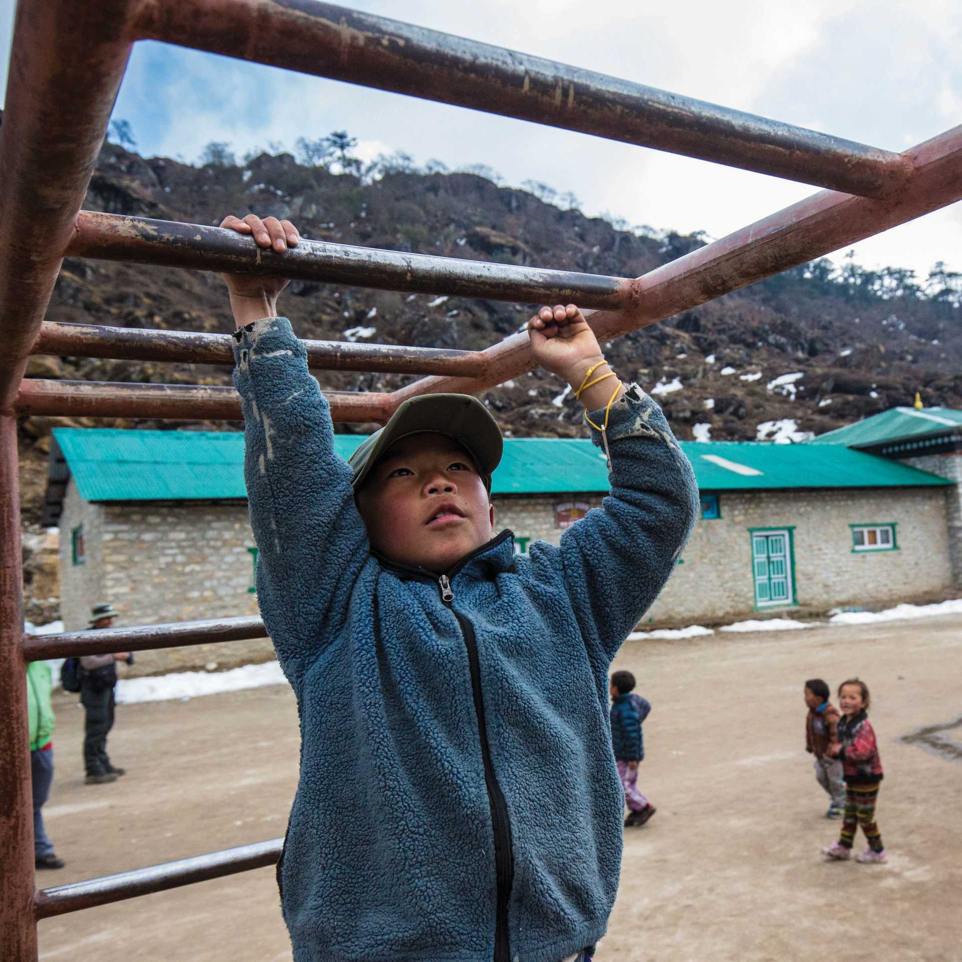 Local child shows off his skills on the monkey bars | Mark Tipple