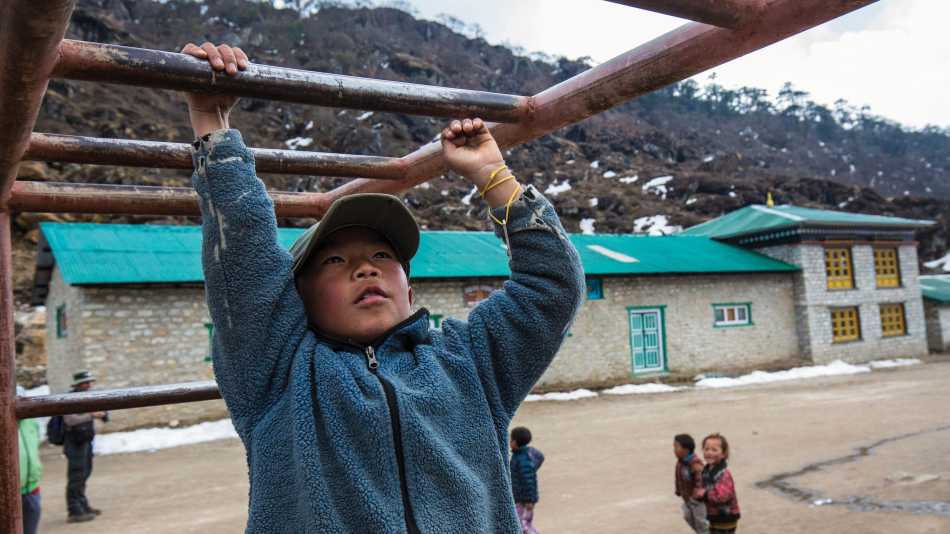 Local child shows off his skills on the monkey bars | Mark Tipple