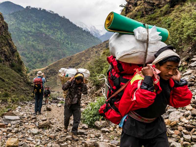 Porters at work in western Nepal | Lachlan Gardiner