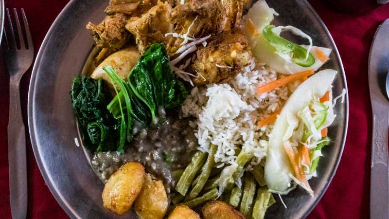 We include freshly prepared, nutritious meals three times a day while on trek in Nepal. | Lachlan Gardiner