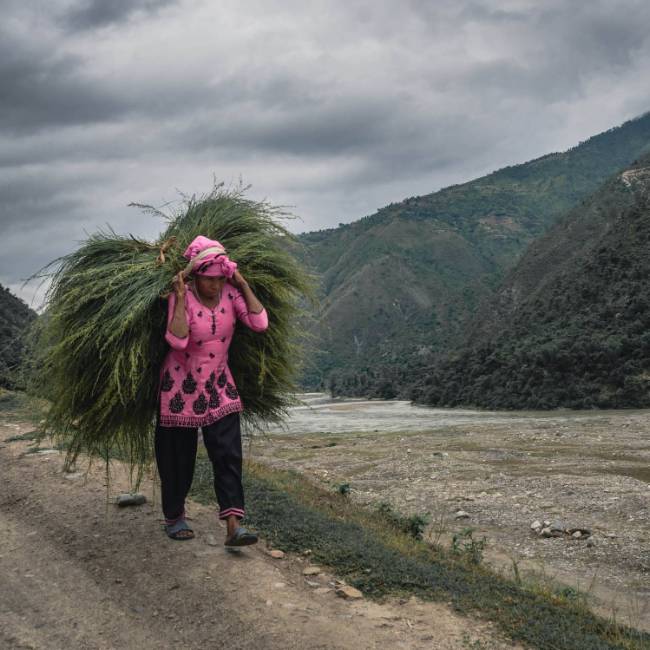 Local Nepali woman going about her daily life | Kelvin Law