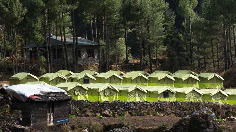Stay at our exclusive eco-campsites complete with raised beds, mattresses and pillows. | Kelvin Law