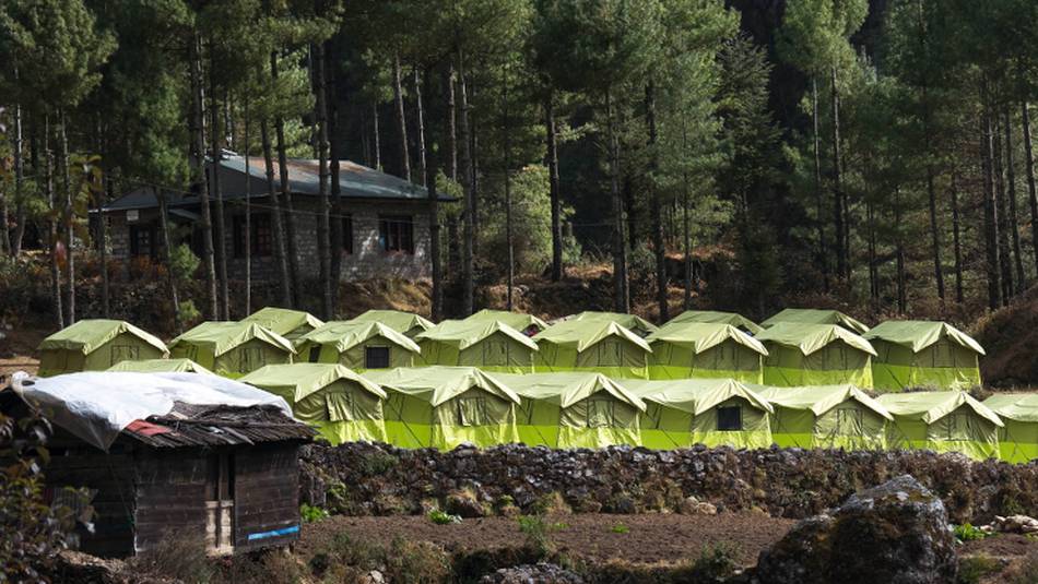 Stay at our exclusive eco-campsites complete with raised beds, mattresses and pillows. | Kelvin Law