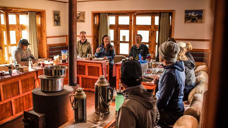 Relax in our warm and inviting dining room at our Eco-Comfort Camps | Tim Charody