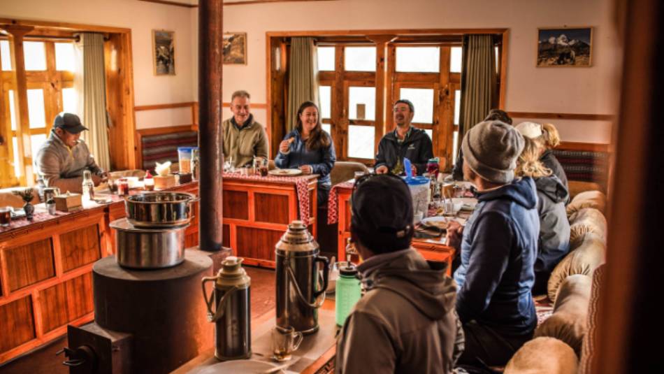 Relax in our warm and inviting dining room at our Eco-Comfort Camps | Tim Charody