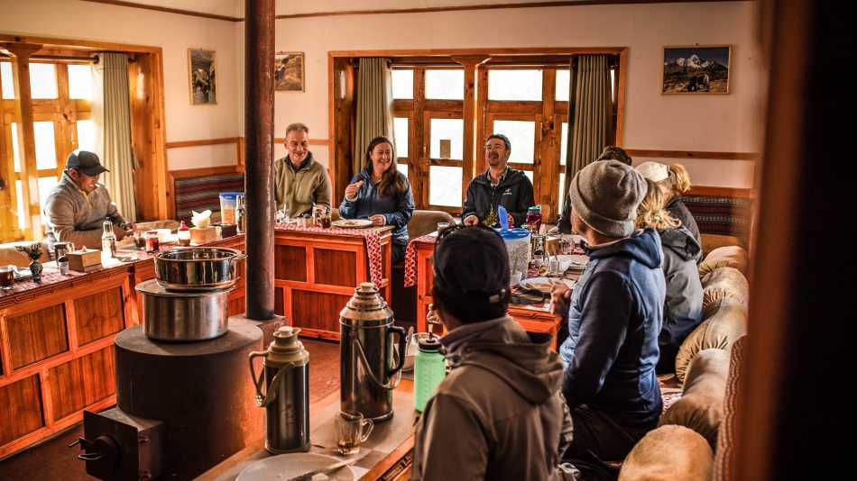 Relax in our warm and inviting dining room at our Eco-Comfort Camps | Tim Charody