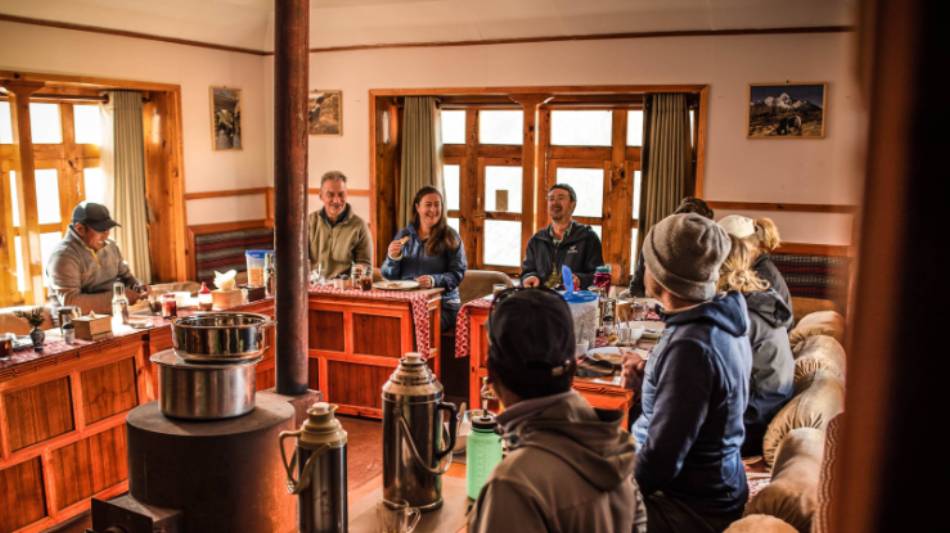 Relax in our warm and inviting dining room at our Eco-Comfort Camps | Tim Charody