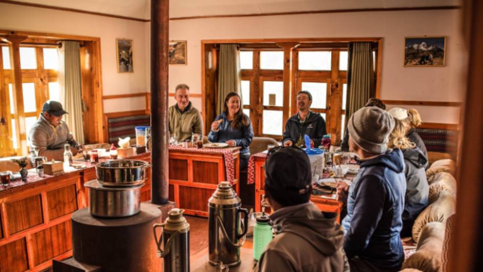 Relax in our warm and inviting dining room at our Eco-Comfort Camps | Tim Charody