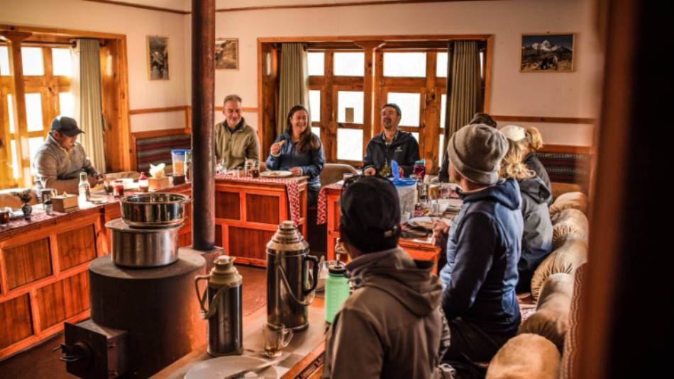 Relax in our warm and inviting dining room at our Eco-Comfort Camps | Tim Charody