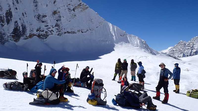 Taking a break before climbing the West Col Baruntse | Giles West, taken on Baruntse/Mera Peak with Andrew Lock in 2024