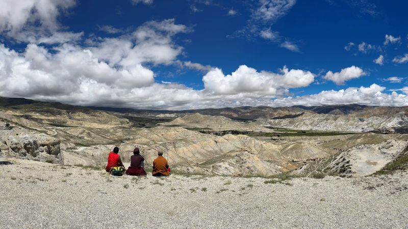 Three monks on the pass above Lo Manthang, looking toward Tibet - Tibetan Heartland Upper Mustang Yartung Festival with Margie Thomas, Nepal