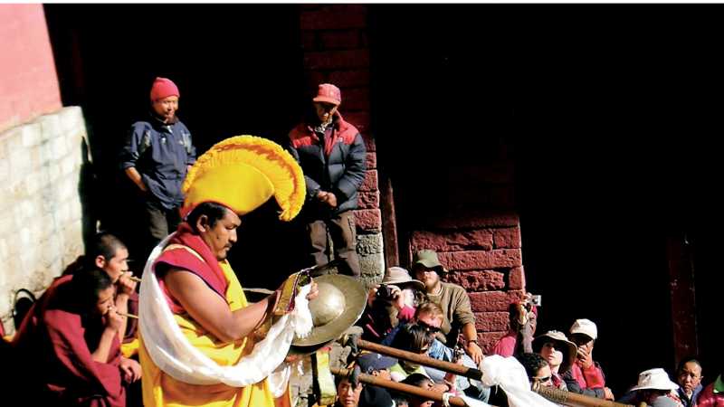 Monks provide music for the Mani Rimdu dance celebration at the Thyangboche Monastery | Philip Bolam