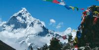 Ama Dablam looms large in the distance -  Photo: Caroline Mongrain