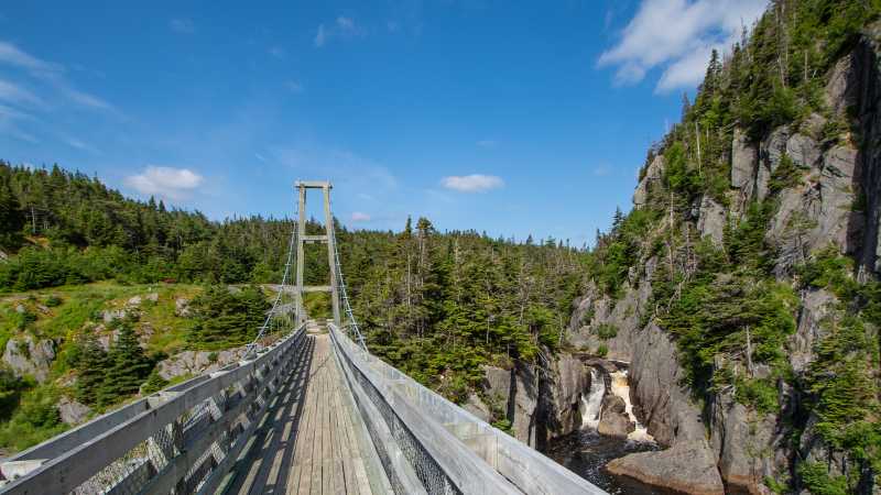 Suspension bridge to the former village of La Manche | Sherry Ott
