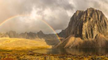 A colourful rainbow near Talus Lake in the Yukon
