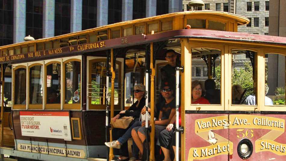 Travellers on the cable car in San Francisco | Graham H.