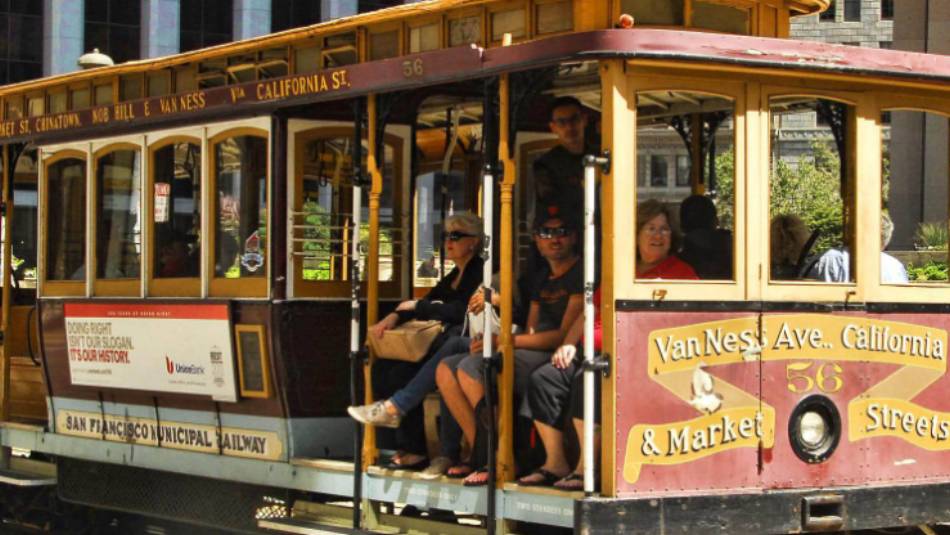 Travellers on the cable car in San Francisco | Graham H.