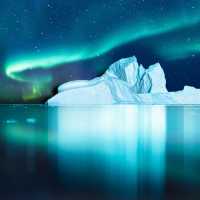 Aurora Borealis lights up the fjord in Greenland