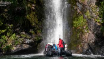 Dusky Sound Waterfall © F.wardle,Fiona Wardle Zodiac cruising in Dusky Sound