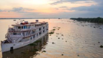 The Jahan on the Mekong,Heritage Lines The Jahan on the Mekong River at sunset, Cai Lay, Tien Giang, Vietnam