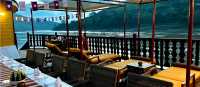 Watch the world pass by from the upstairs sun deck