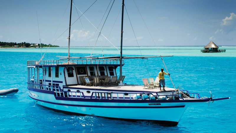 A traditional dhoni cruise is the best way to explore the turquoise waters of the Maldives - Maldives Dhoni Photography Expedition with Paul Zizka, Maldives