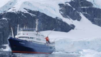 The Plancius anchors in Antarctica