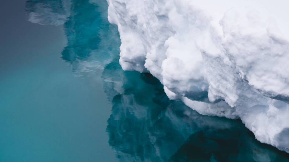 Reflections of an iceberg, Commonwealth Bay, Antarctica | Kylie Jones