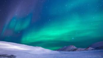 Northern lights dance across the sky for a spectacular ethereal display