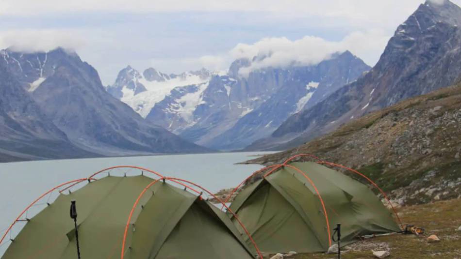 Camping and trekking in the Ammassalik fjord system Greenland