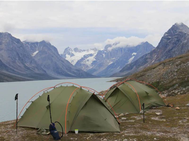 Camping and trekking in the Ammassalik fjord system Greenland