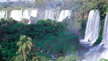 Taller and twice as wide as Niagara Falls with 275 cascades, nothing quite describes the grandeur of the Iguazu Falls