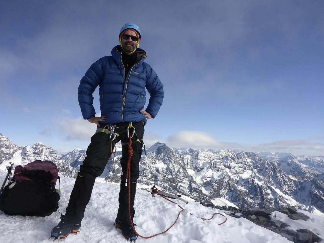 Summit sucess! Mountaineer at the top of Pequeno Alpamayo (5425m) |  <i>Anthony Bohm</i>
