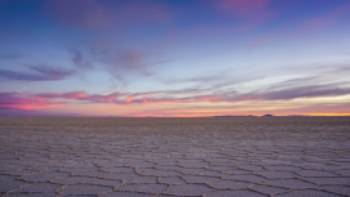 Sunset at Uyuni: The day ends with a stunning light show over the salt flats.