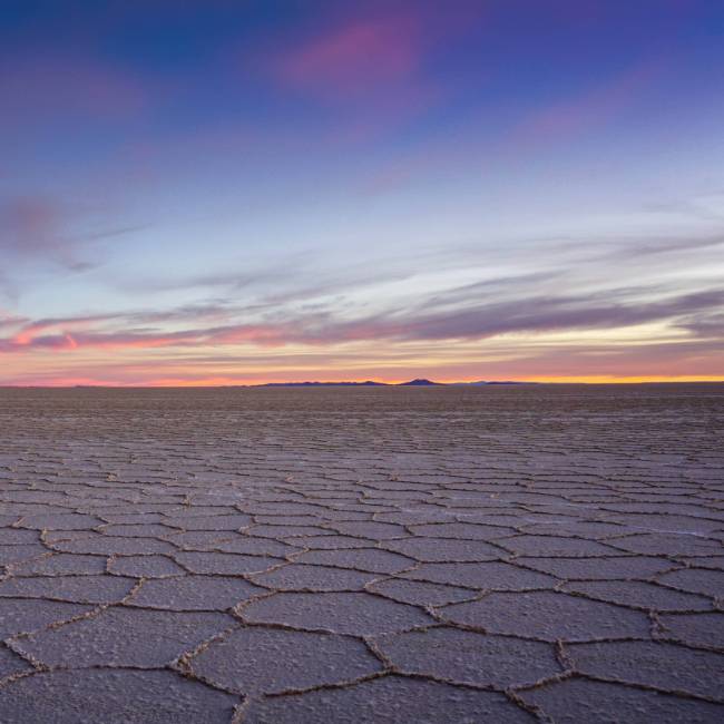Sunset at Uyuni: The day ends with a stunning light show over the salt flats.