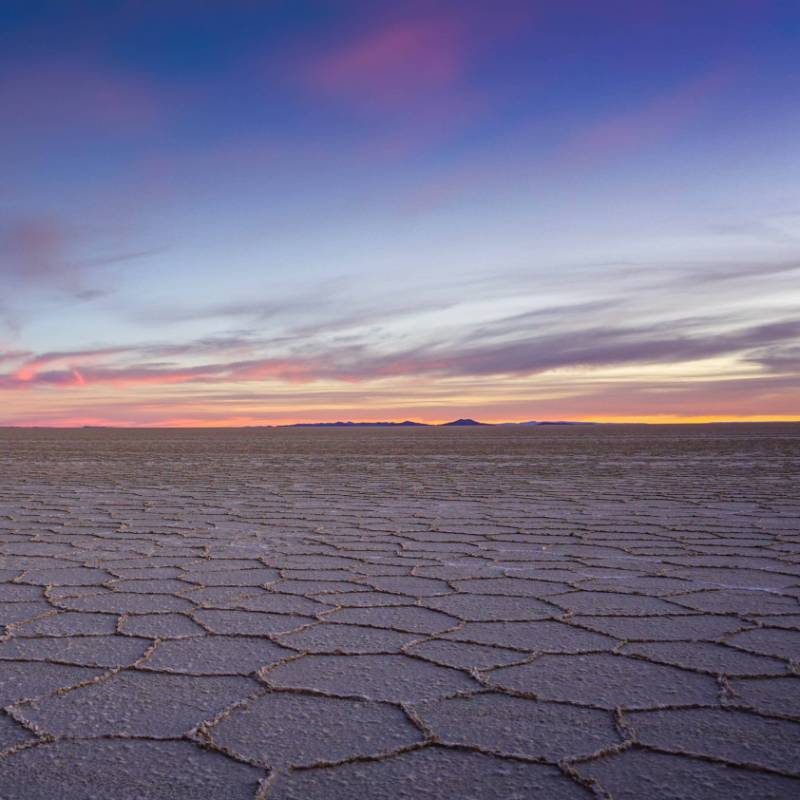 Sunset at Uyuni: The day ends with a stunning light show over the salt flats.