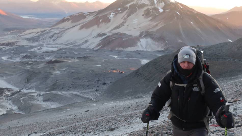 Ascending Ojos del Salado as the sun rises | Lydia Bradey