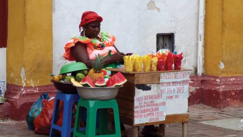 Local woman selling fresh fruits on the streets of Colombia&#160;-&#160;<i>Photo:&#160;Pat Rochon</i>
