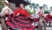 Colourful Cumbia dance, Colombia -  Photo: Scott Pinnegar