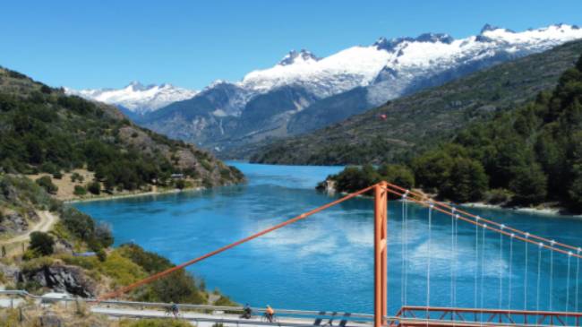 Cycling General Carrera Lake hanging bridge & northern Ice fields in the back