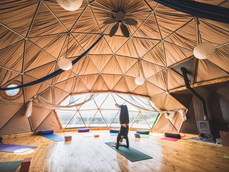 Take the chance to take a break and take a yoga class overlooking the stunning scenery in Torres del Paine National Park | Timothy Dhalleine