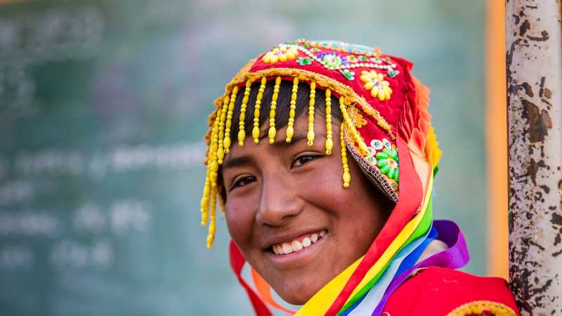 Local Peruvian smiling for the camera | Richard I'Anson