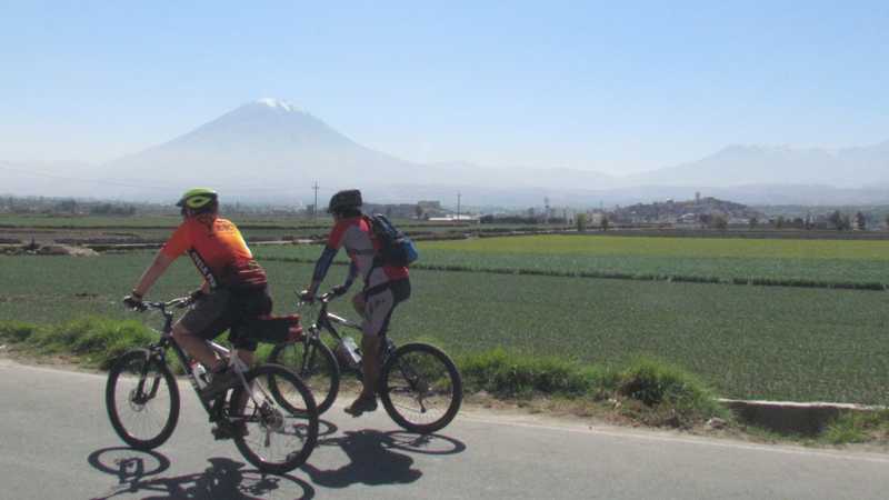 Cycling on quiet rural roads near Arequipa, El Misti towering in the background | Louise Vargaya Conza